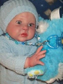 Angel Gabriel Looks very realistic. Reborn Doll. Big baby blue eyes